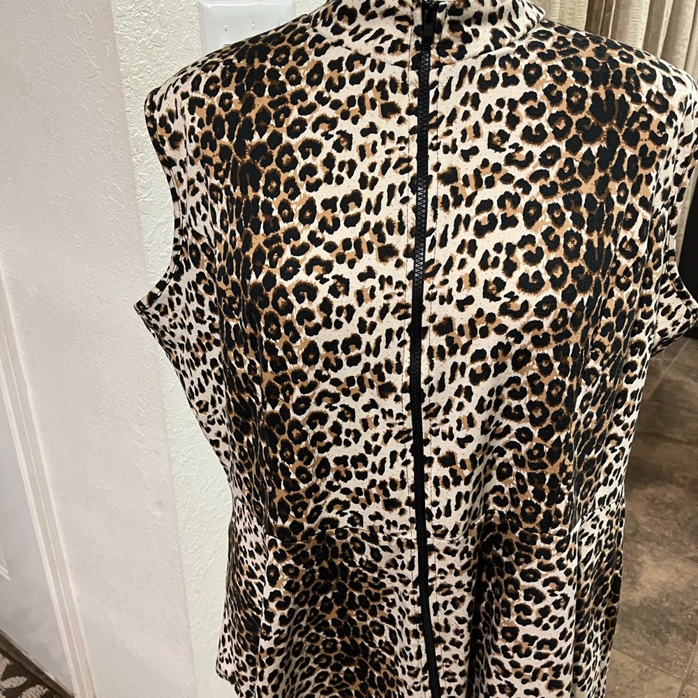 Plus Size Cheetah Print Peplum Top Stretch no size tag but a 3X.